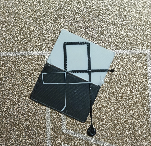 The calibration model has obvious print quality issues, leading to calibration failure